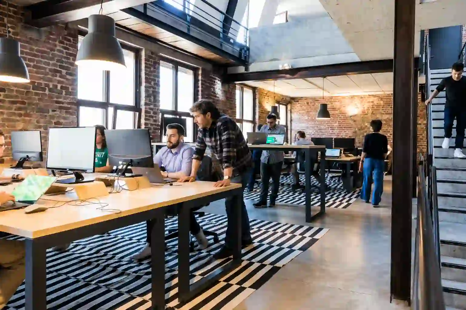 EdTech startup founders reviewing a learning platform MVP on screen