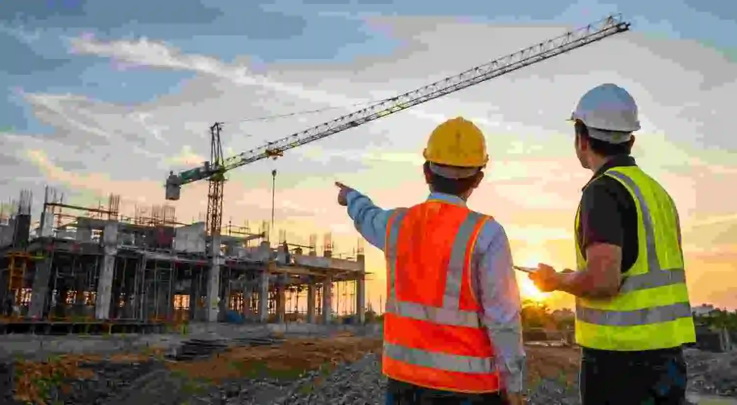Construction site with equipment and workers on an active building project