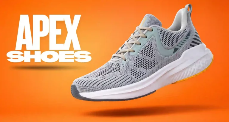 Grey Apex athletic running shoe with breathable mesh upper and cushioned white sole on a bright orange background.